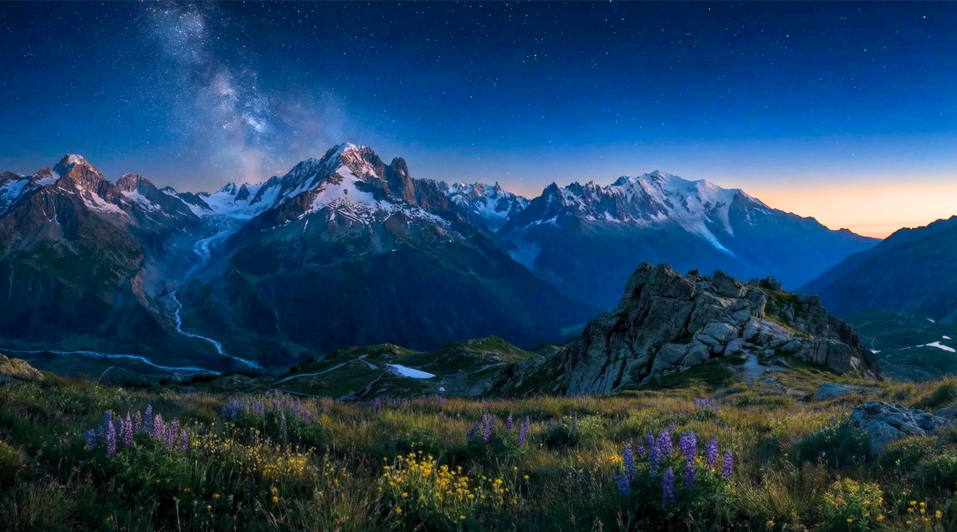 Lighthouse on rocky coast under a starlit sky